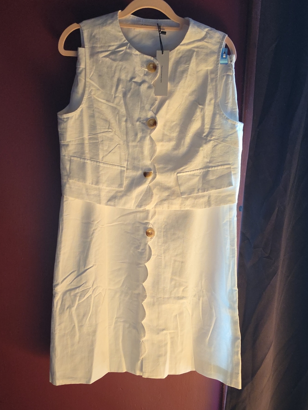 Sleeveless White Scallop-Button Top And Skirt
